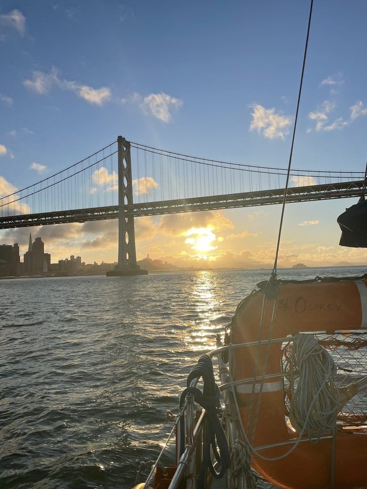 Sunset and cloud over the Golden Gate Bridge from the water